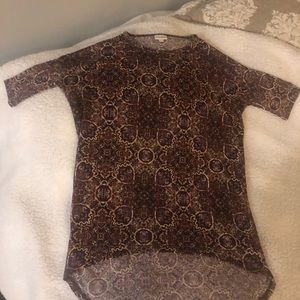 Cute and stylish summer top  great with tights !!